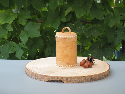 Storage boxes made of birch bark and birch wood, base and lid braided with light birch bark