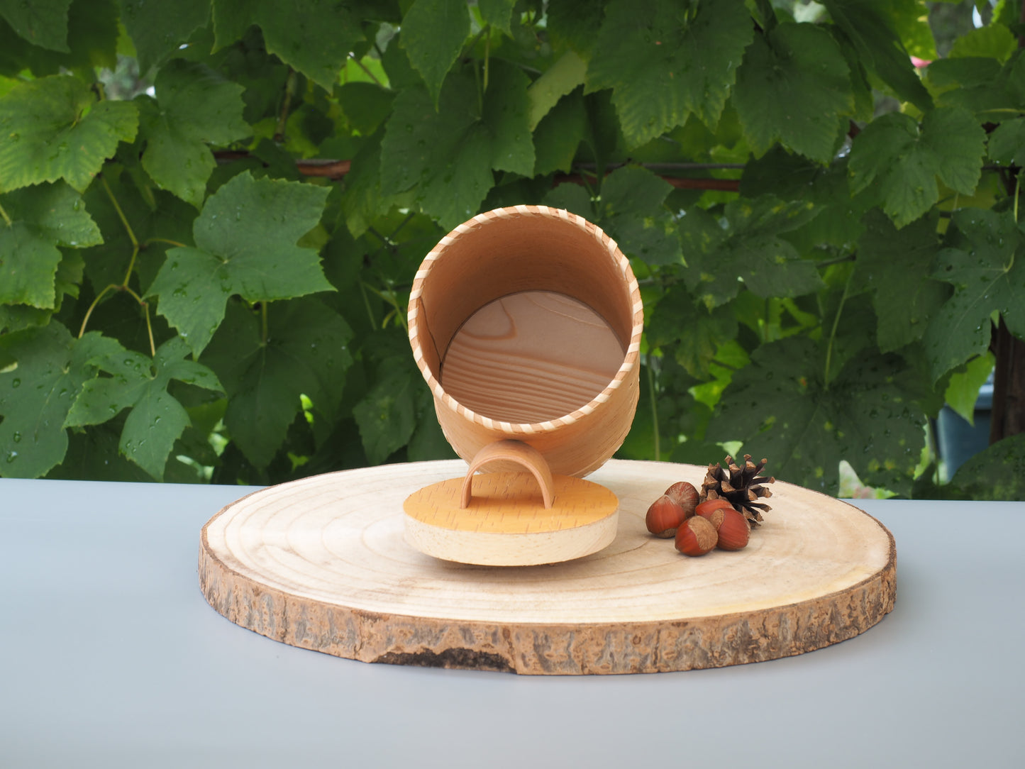 Storage boxes made of birch bark and birch wood, base and lid braided with light birch bark